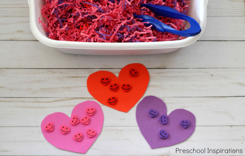 Kids can explore sorting and counting this Valentine's Day with a colorful hearts sensory bin.