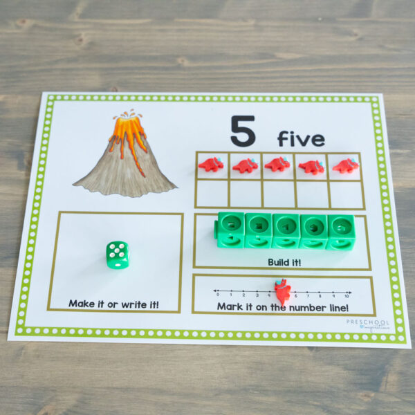 dinosaur ten frame filled with manipulatives showing the number five