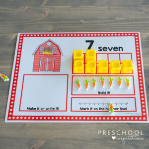 a farm theme ten frame mat filled in with the number seven