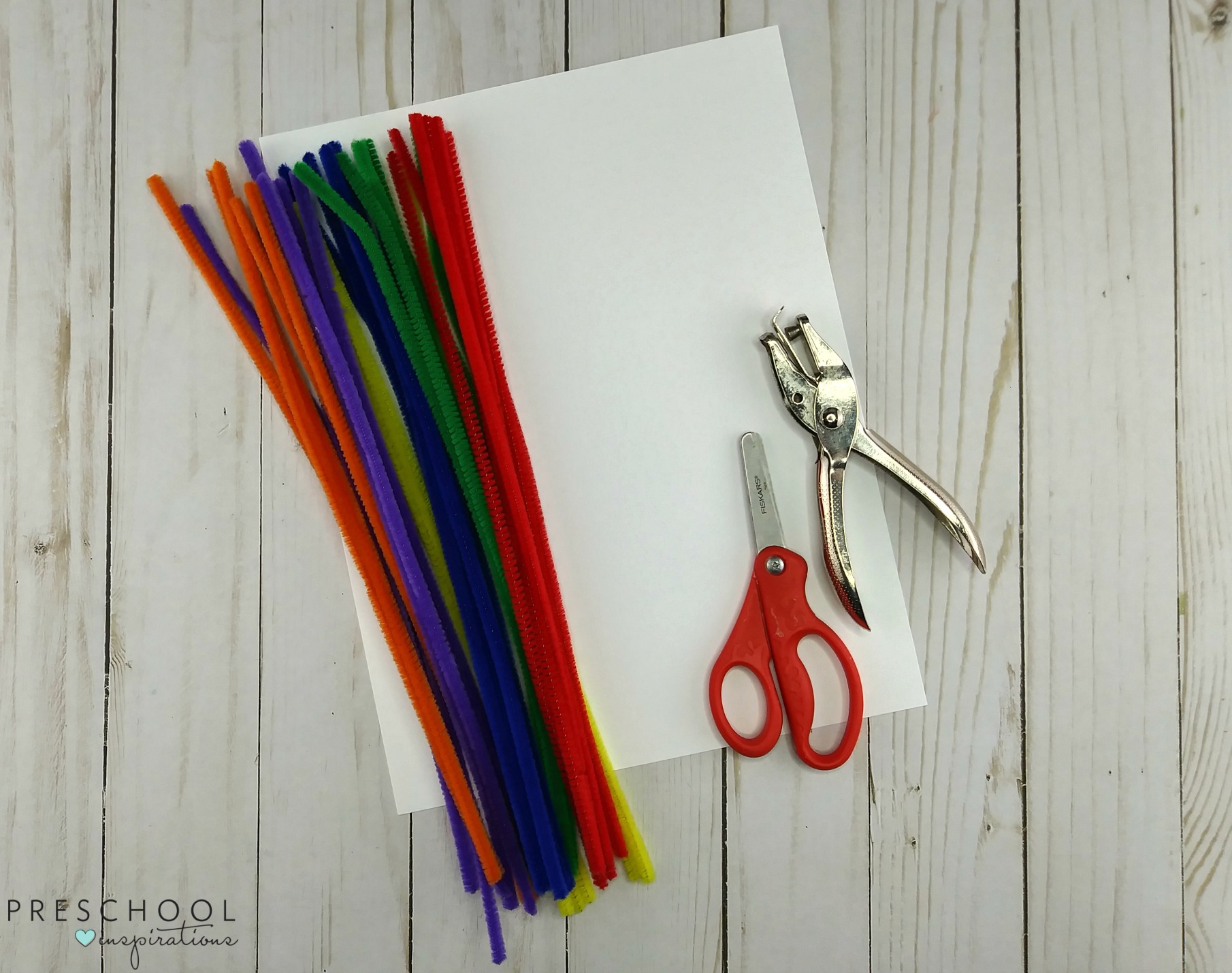 Materials to make a preschool rainbow craft