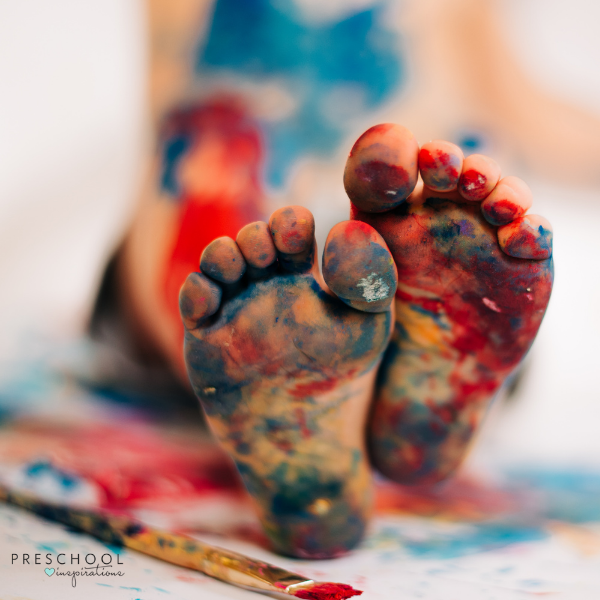 a 2-year-old's feet messy with paint